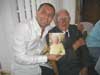 2007 another Uncle Bill 100th birthday photo with my son Sam holding the card from the Queen 